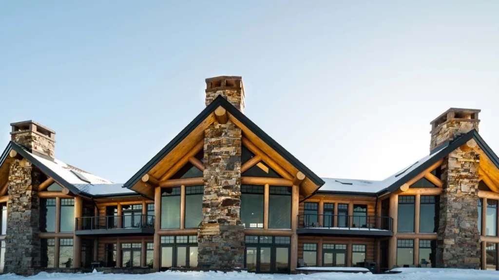 a huge log-home style lodge in the winter