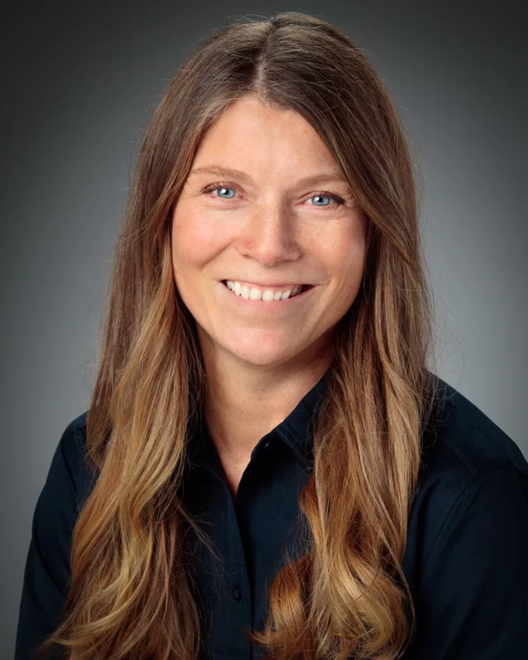 portrait headshot of Jenny Walsberg as a Bruckelmyer Brothers employee